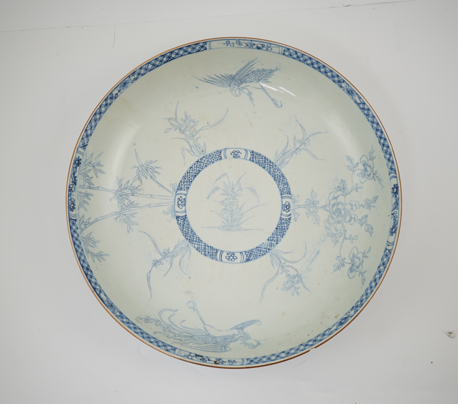 A Chinese blue and white ‘crane and phoenix’ dish, Yongzheng period